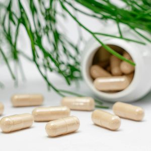 Bottle of supplements recommended to patients for a natural way to feel better