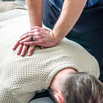 Man getting chiropractic adjustment at Greenbrier Family Chiropractic in Chesapeake, VA