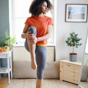 Woman stretching after visit to Greenbrier Family Chiropractic in Chesapeake, VA