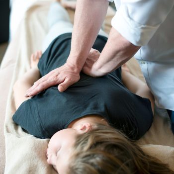 Girl getting pediatric adjustment at Greenbrier Family Chiropractic in Chesapeake, VA